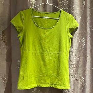 Green work-out shirt. Size small. Colour in green/black.